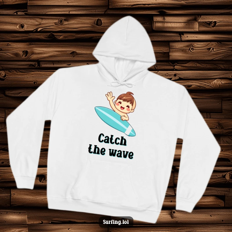 Funny hoodie with a sweet cartoon character waving joyfully from a surfboard, offering warmth and a dose of humorous beachy vibes.